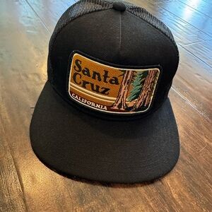 Santa Cruz Black Trucker Hat by BartBridge